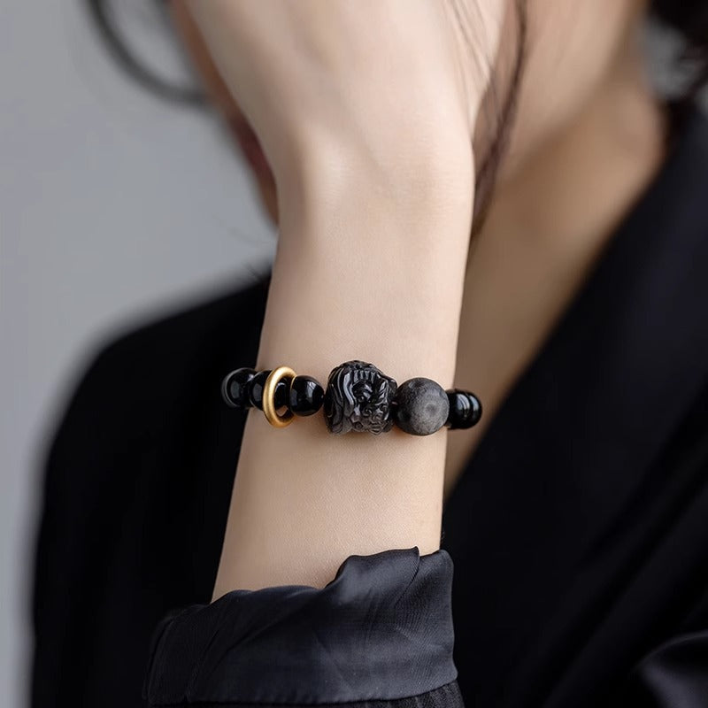 Obsidian Guardian Lion Bracelet – Hand-Blessed by a Feng-Shui Master   Channel ancient Eastern power to amplify your luck, career, wealth and health.